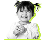 Smiling little girl with pig tails black and white